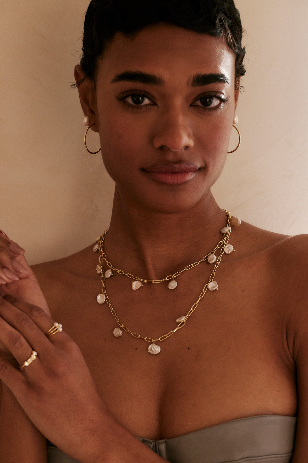 Model wearing grit look - Grit necklace, choker and rings