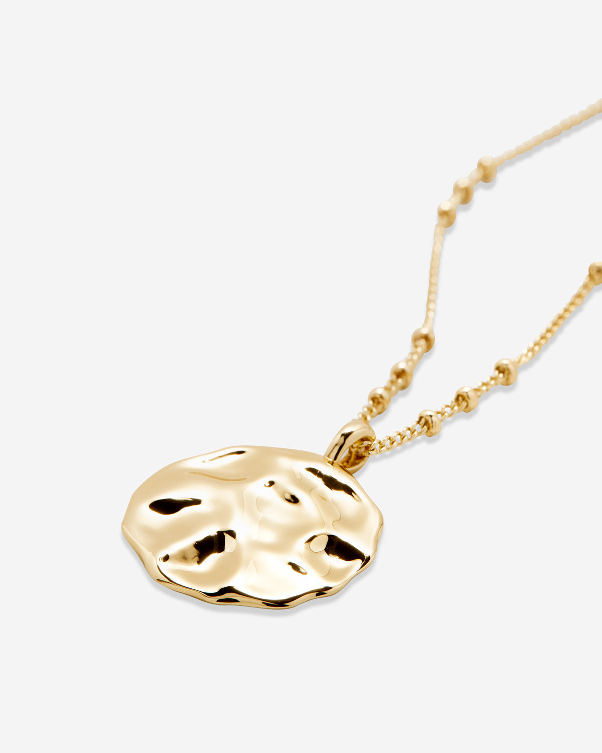 Bryan Anthonys Gold Depth Pendant Necklace Macro