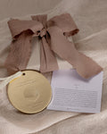 Bryan Anthonys Grit Metal Holiday Ornament in Gold with Meaning Card