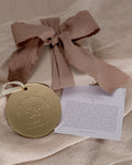 Bryan Anthonys No Fine Print Metal Holiday Ornament in Gold with Meaning Card