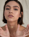 Bryan Anthonys Us Against The World Gold Necklace On Model