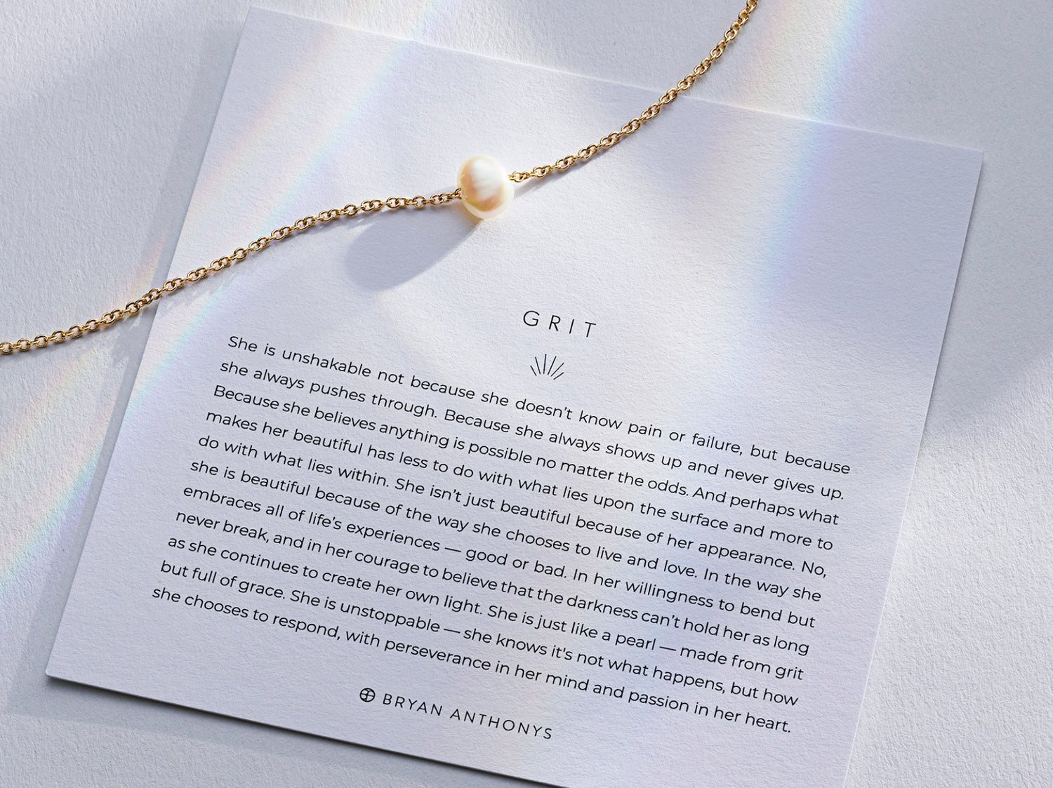 Grit Pearl Necklace in Gold with Description Meaning Card