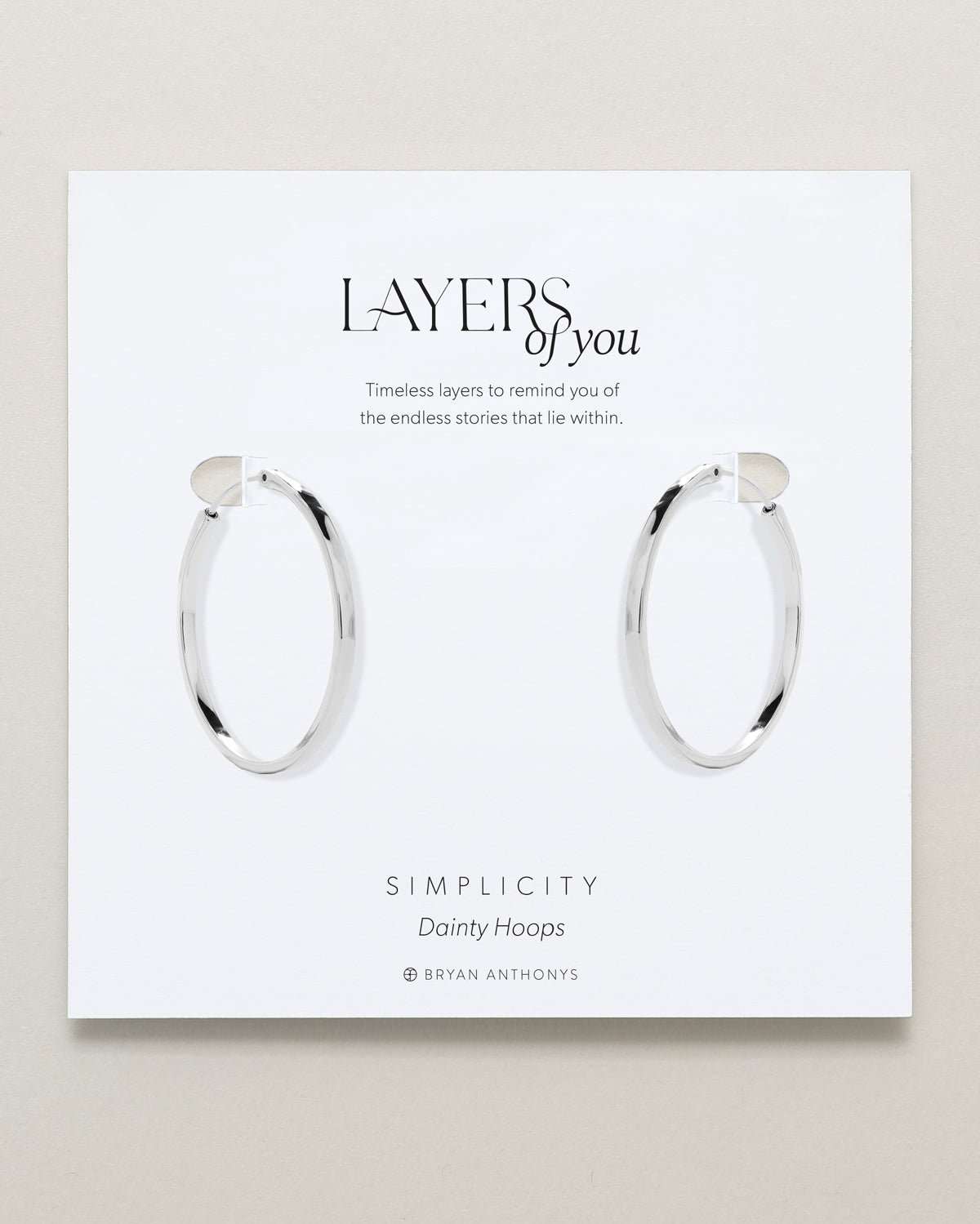 Bryan Anthonys Layers of You Simplicity Silver Hoop Earrings On Card