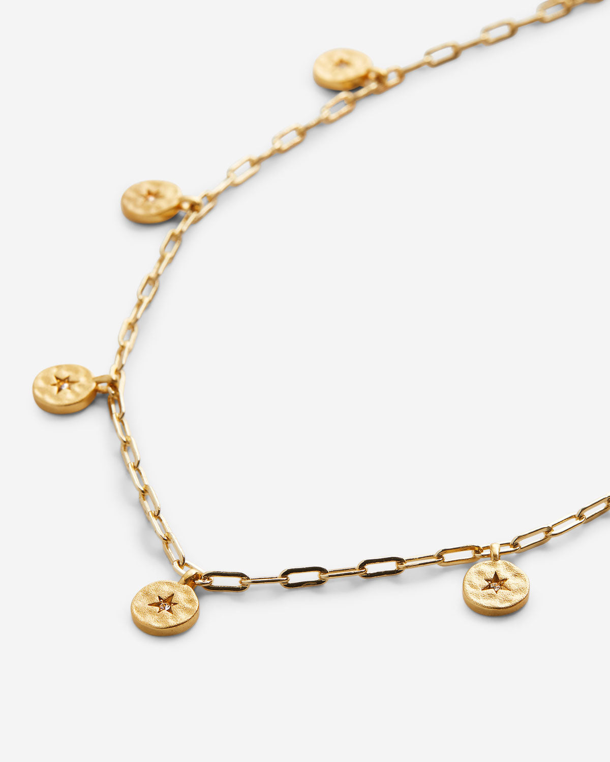 Close-up of Stars Can't Shine Without Darkness Choker in 14k gold finish