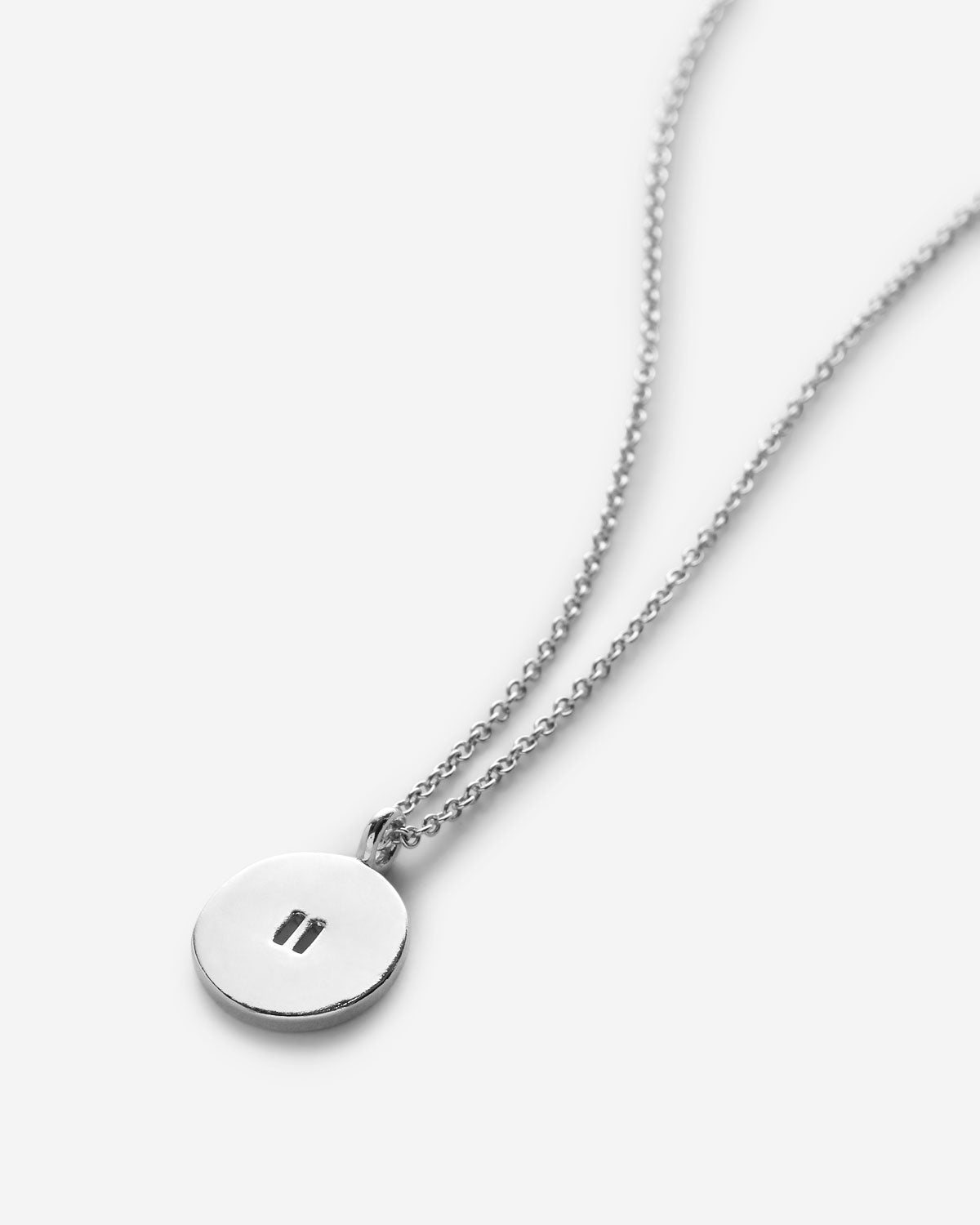 Close-up of Pause Necklace in silver finish