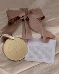 Bryan Anthonys Home Metal Holiday Ornament in Gold with Meaning Card