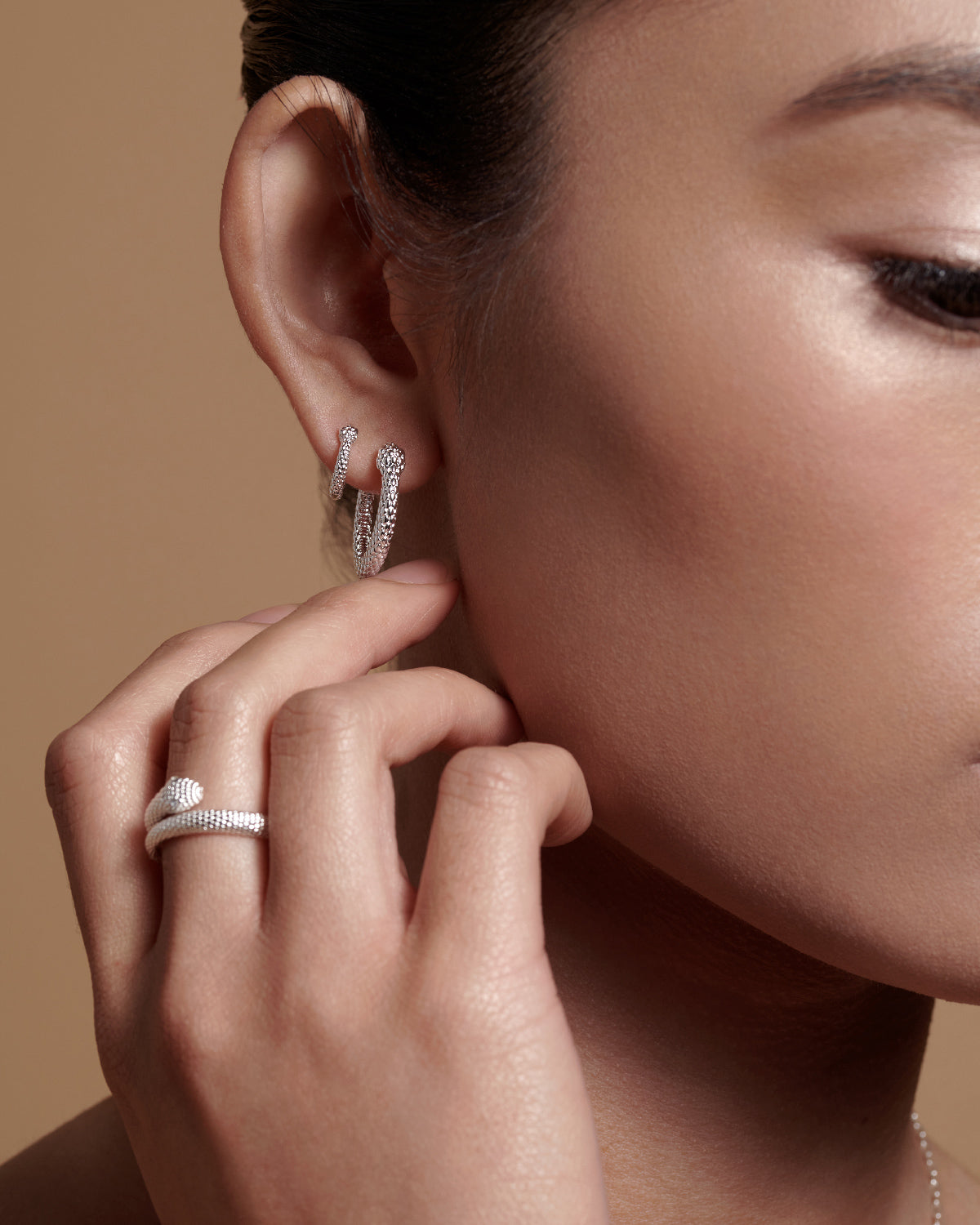 Bryan Anthonys Begin Again Midi Hoop Earrings on Model in Silver