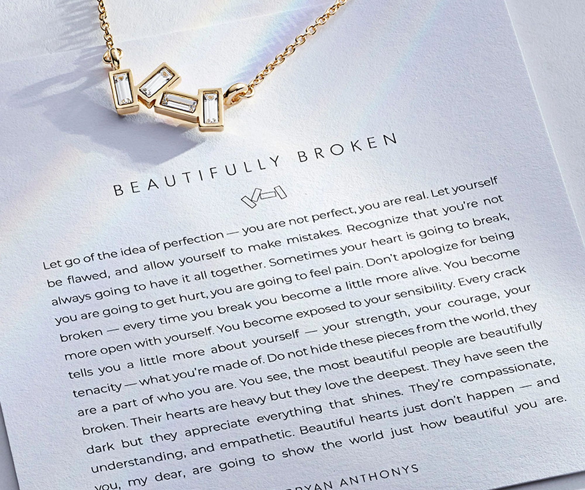 Beautifully broken necklace on card