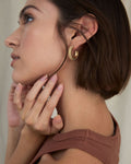 Bryan Anthonys Aligned Beaded Hoop Earrings On Model
