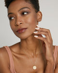 Model wearing Create Your Own Constellation Necklace in 14k gold finish