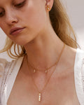 Bryan Anthonys Nurse Gold Necklace with Crystals On Model