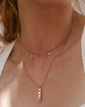 Bryan Anthonys Nurse Gold Necklace with Crystals On Model