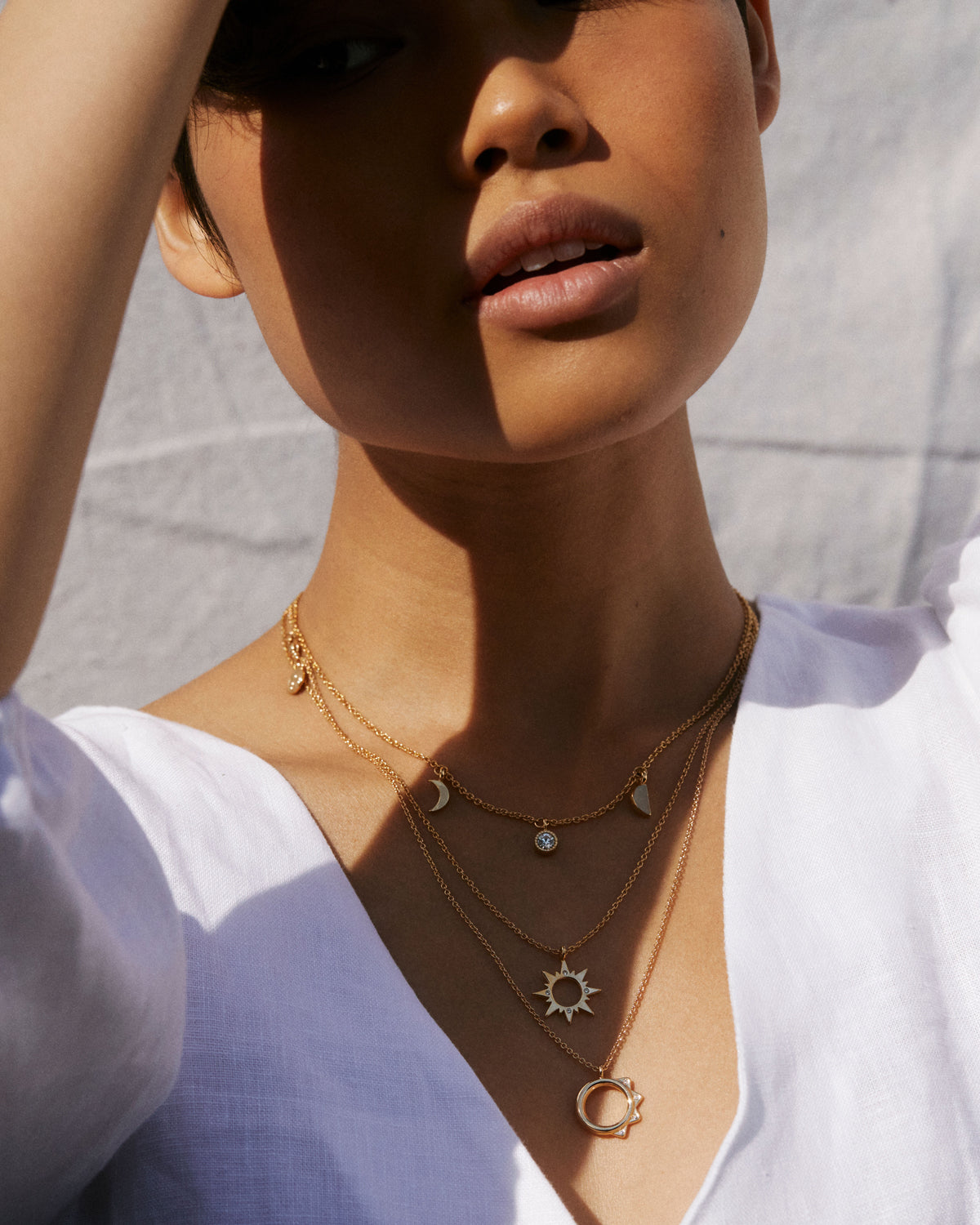 Bryan Anthonys Sun Will Rise Gold Necklace with crystals on model