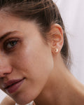 Bryan Anthonys One Door Closes Gold Stud Earring On Model