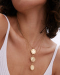 Model wearing Depth Necklace in 14k gold finish
