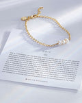 Grit Dainty Chain Bracelet showcase in 14k gold on card