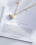 Reach For The Stars Choker showcase in 14k gold on card