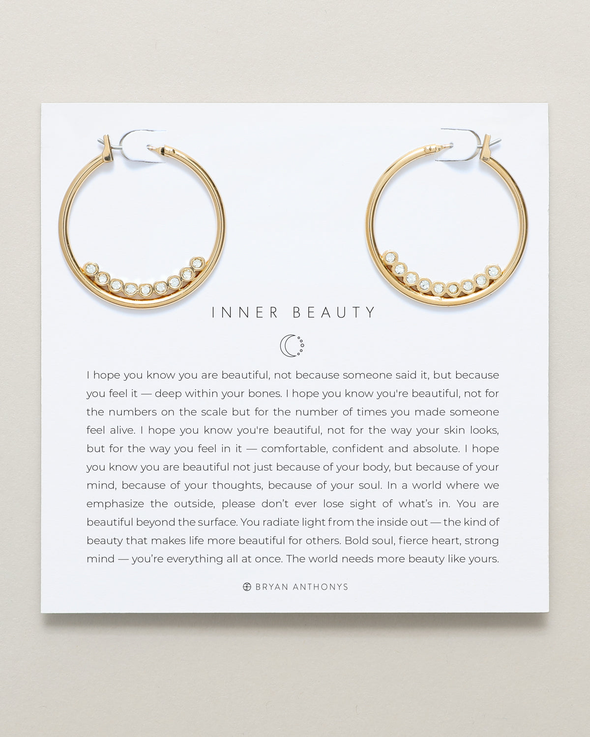Bryan Anthonys Inner Beauty Gold Hoop Earrings With Crystals On Card