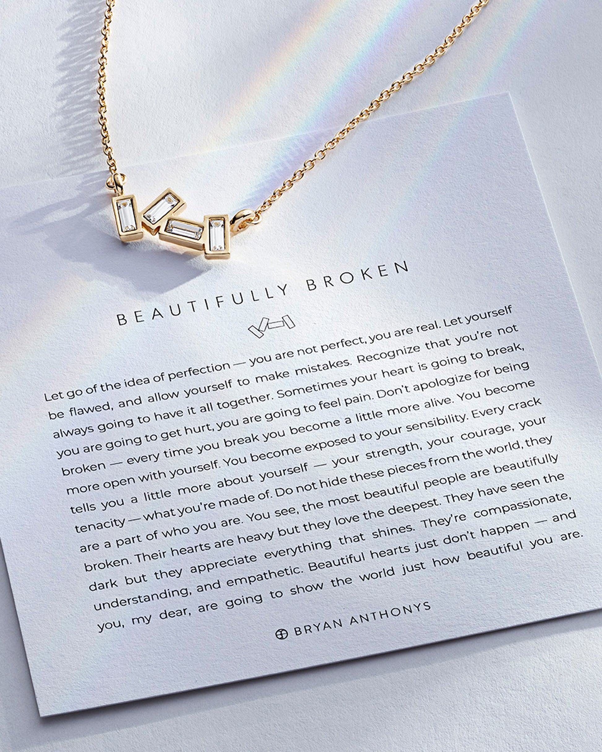 Beautifully Broken Necklace showcase in 14k gold on card