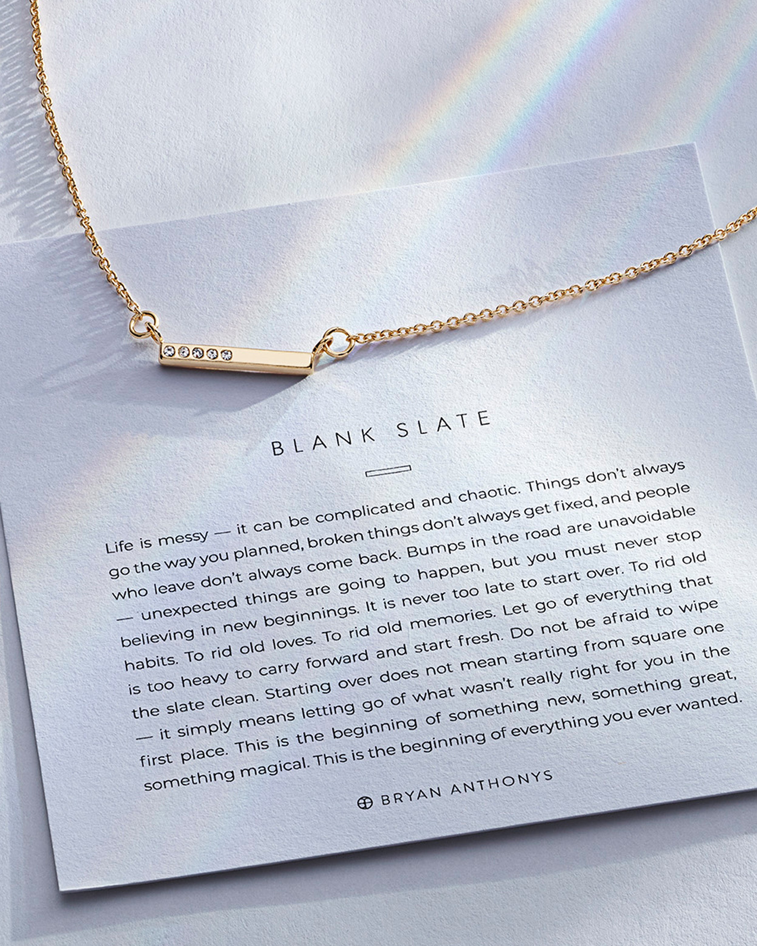Blank Slate Necklace showcase in 14k gold on card
