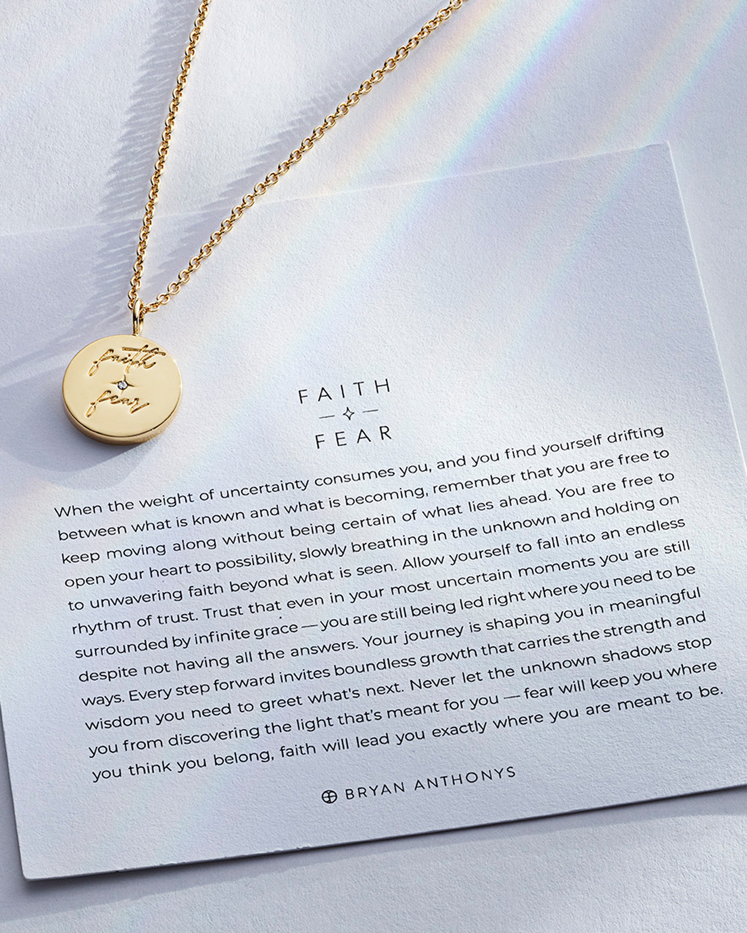 Faith Over Fear Necklace showcase in 14k gold on card
