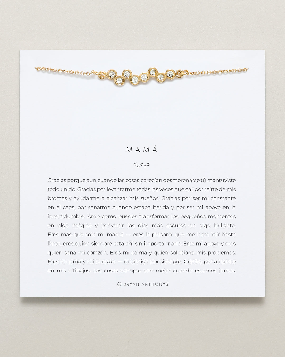 Mamá Necklace (Spanish) on card