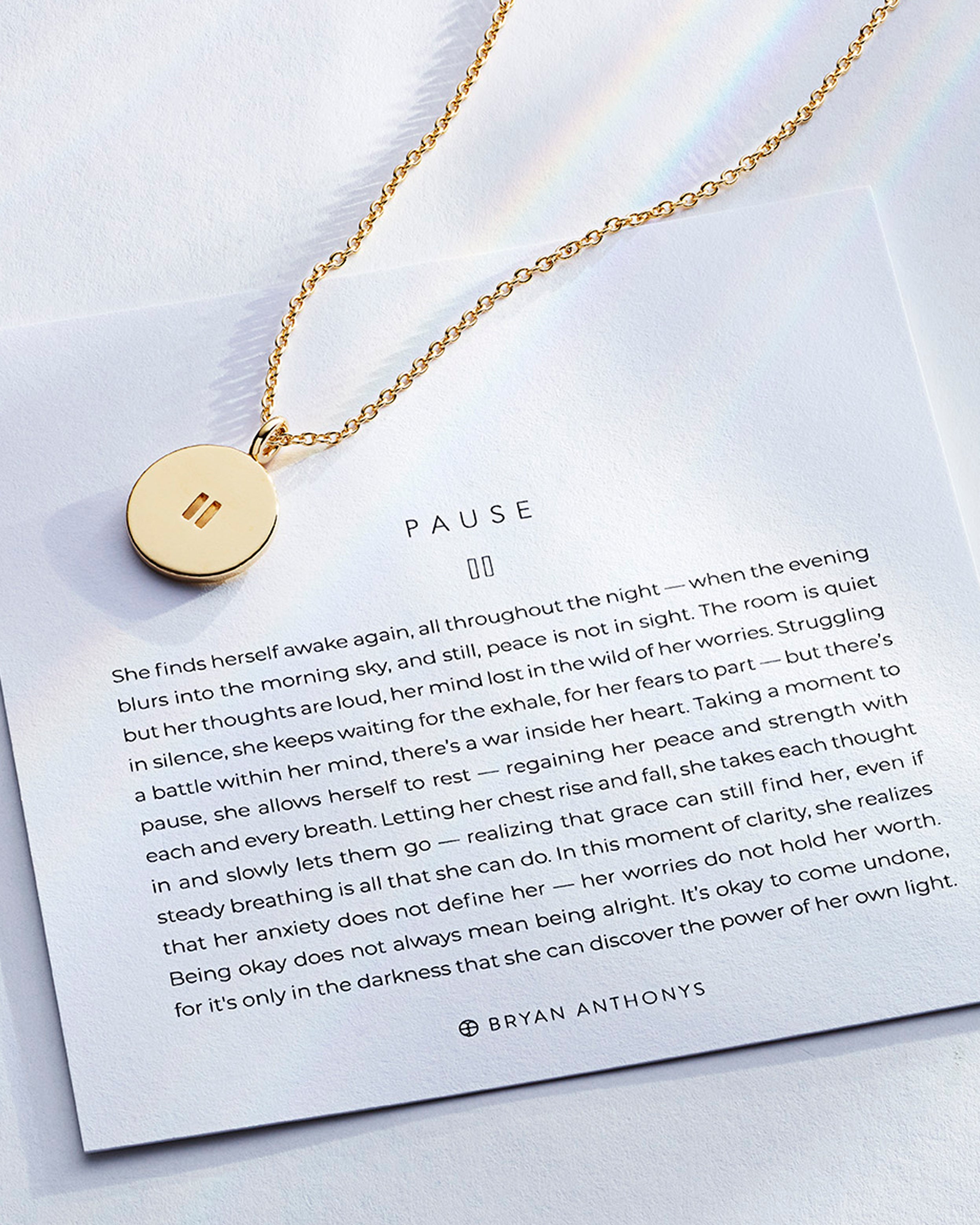 Pause Necklace showcase in 14k gold on card