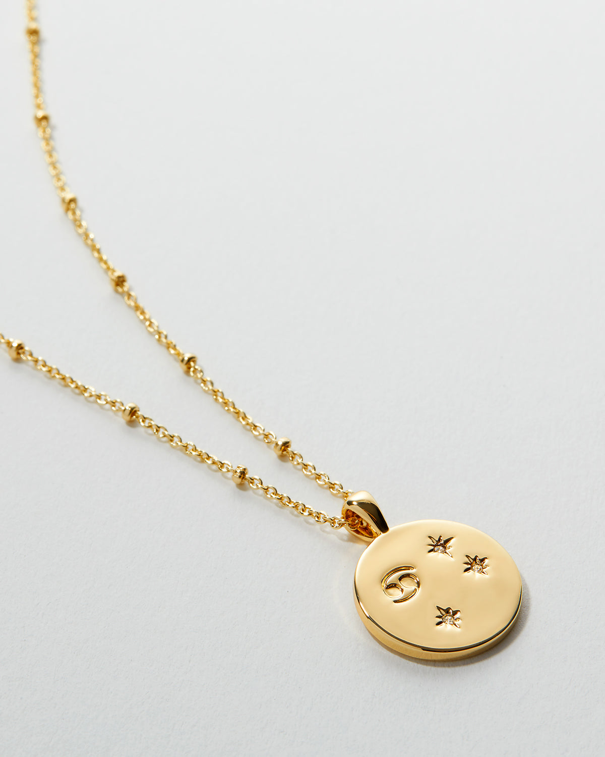 Bryan Anthonys Gold Cancer Zodiac Necklace Macro