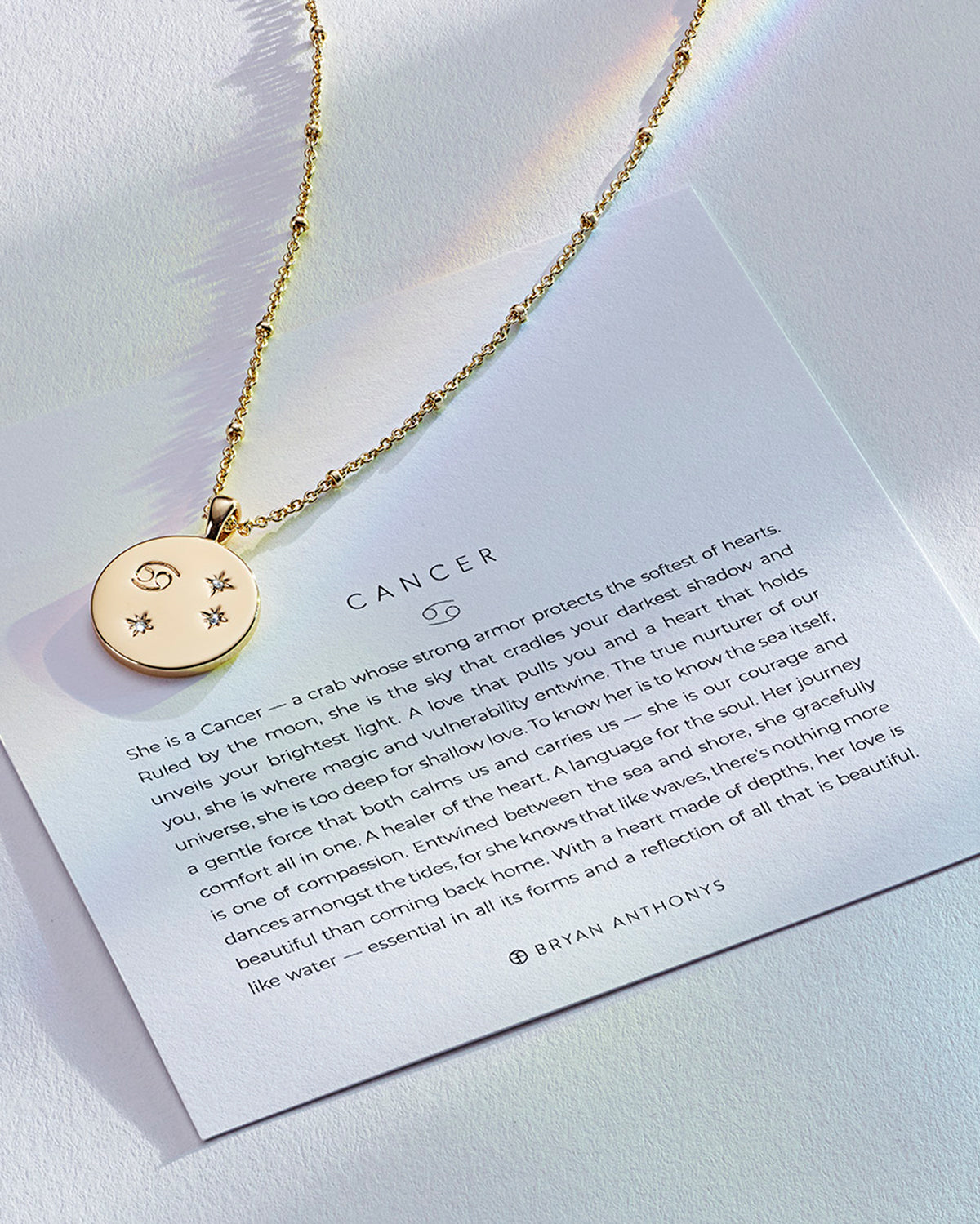 Bryan Anthonys Gold Cancer Zodiac Necklace On Card