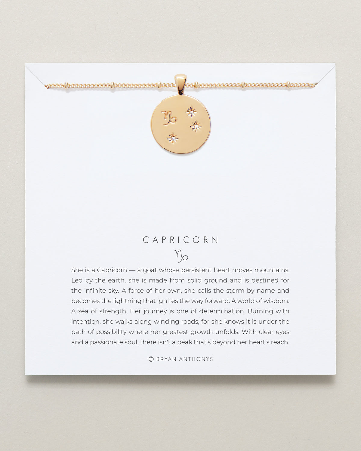Bryan Anthonys Gold Capricorn Zodiac Necklace On Card