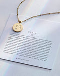 Bryan Anthonys Gold Gemini Zodiac Necklace On Card