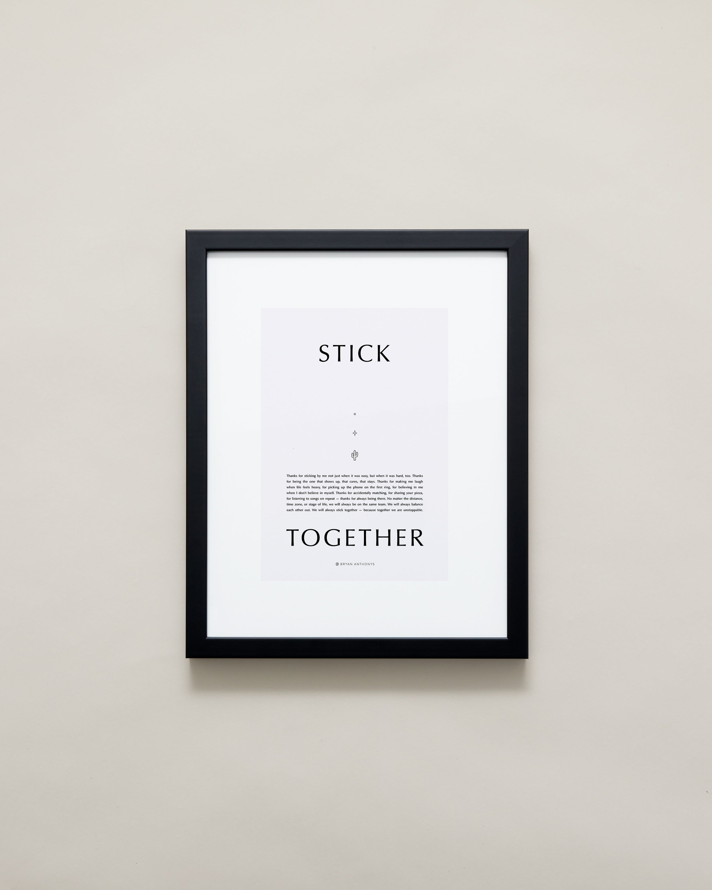 Stick Together Iconic Framed Print showcase small black frame